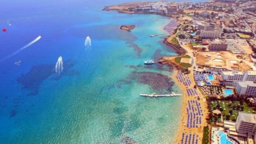 Fig Tree Bay is a sandy beach in the resort of Protaras, Cyprus. In 2011, TripAdvisor declared it to be the third best beach in Europe,[1] but it dropped to 13th place in 2013.[2]As with all beaches in Cyprus, access to the public is free, whilst bed and umbrella hire is chargeable. A municipal car park provides parking within a short walk. The sandy beach stretches for 500m and the waters are clean enough for the beach to have been awarded blue flag designation.[3] The beach, which runs the length of its own cove, takes its name from the fig trees located close to the coast.https://en.wikipedia.org/wiki/Fig_Tree_Bay